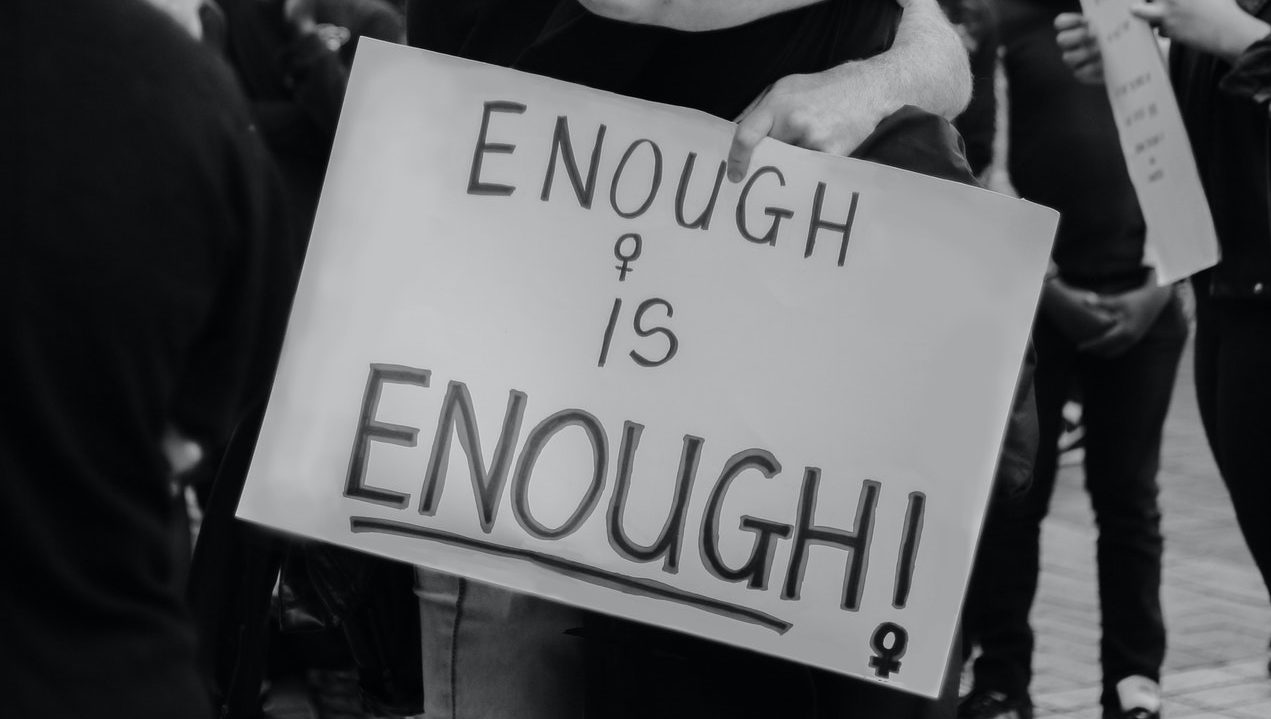 Protest sign saying enough is enough